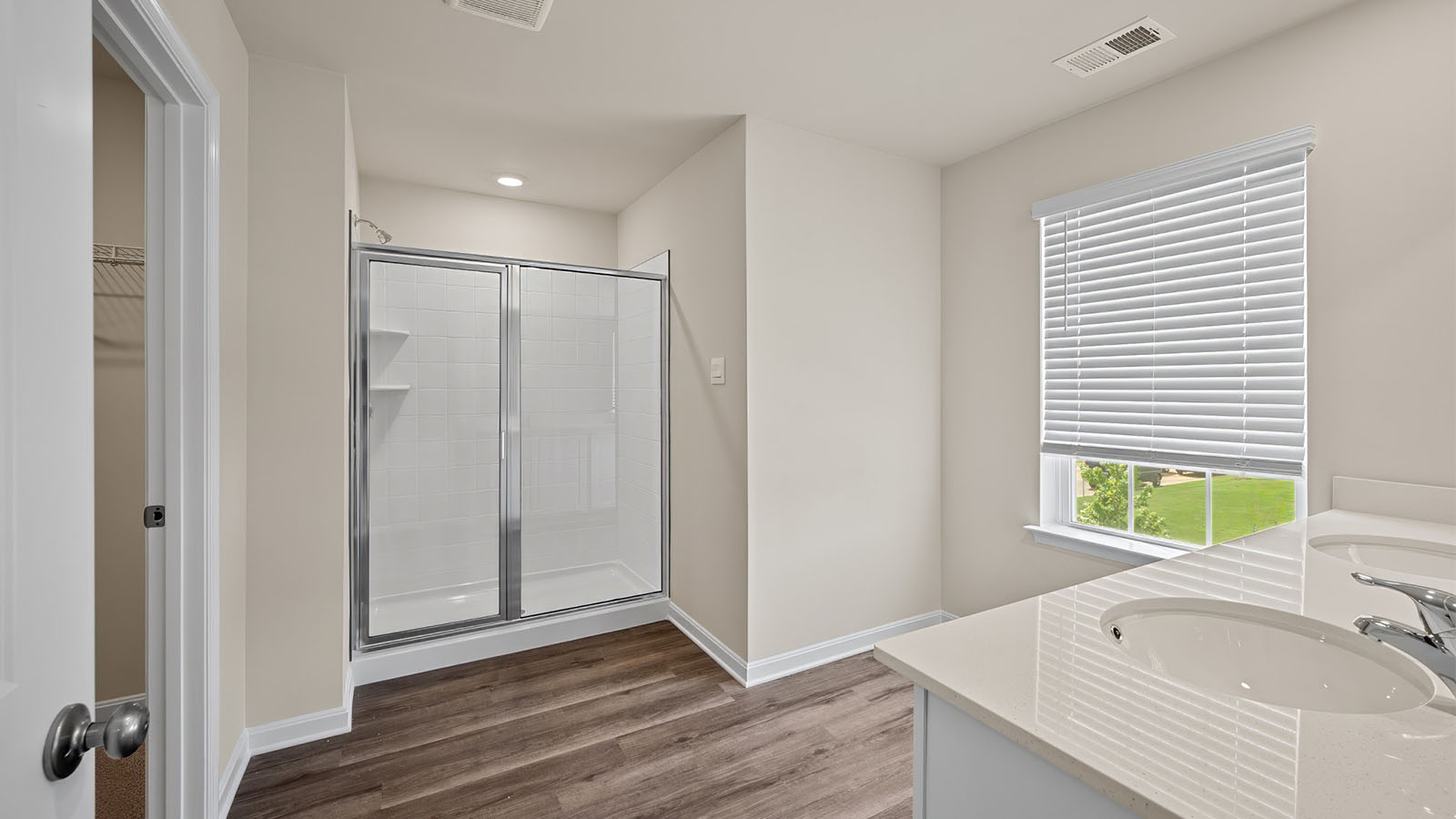 primary bathroom with standing glass shower