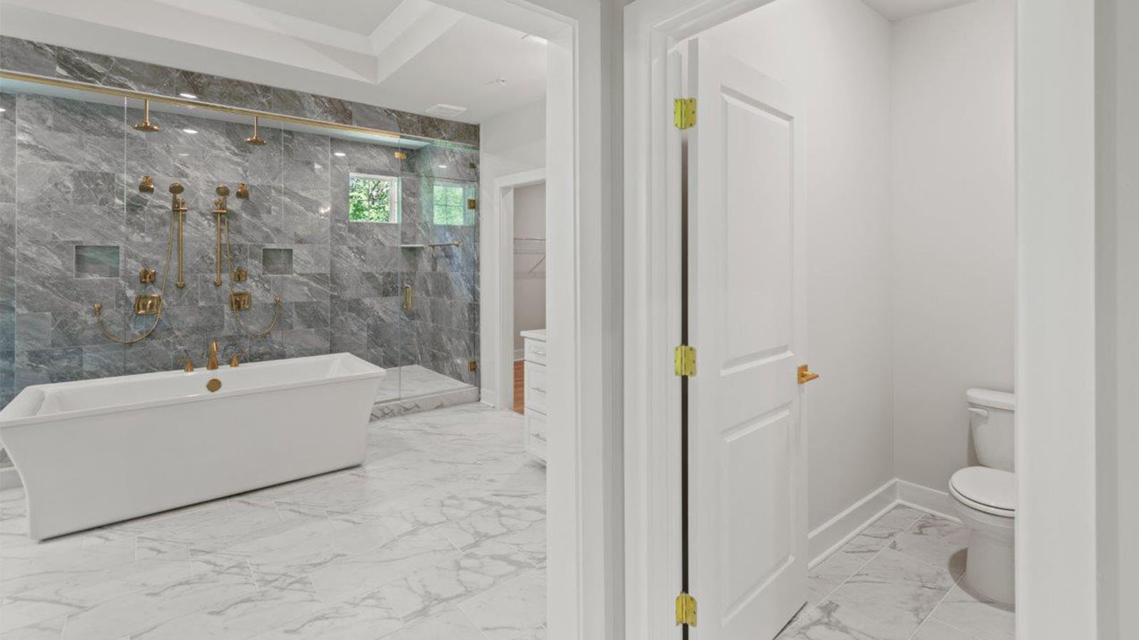 master bathroom with private toilet