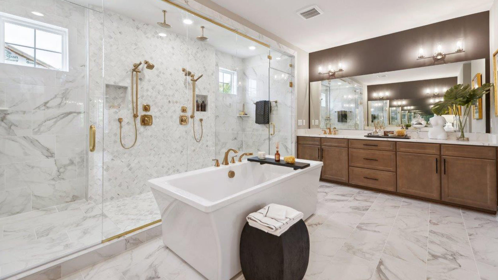 master bathroom glass shower and soaking tub