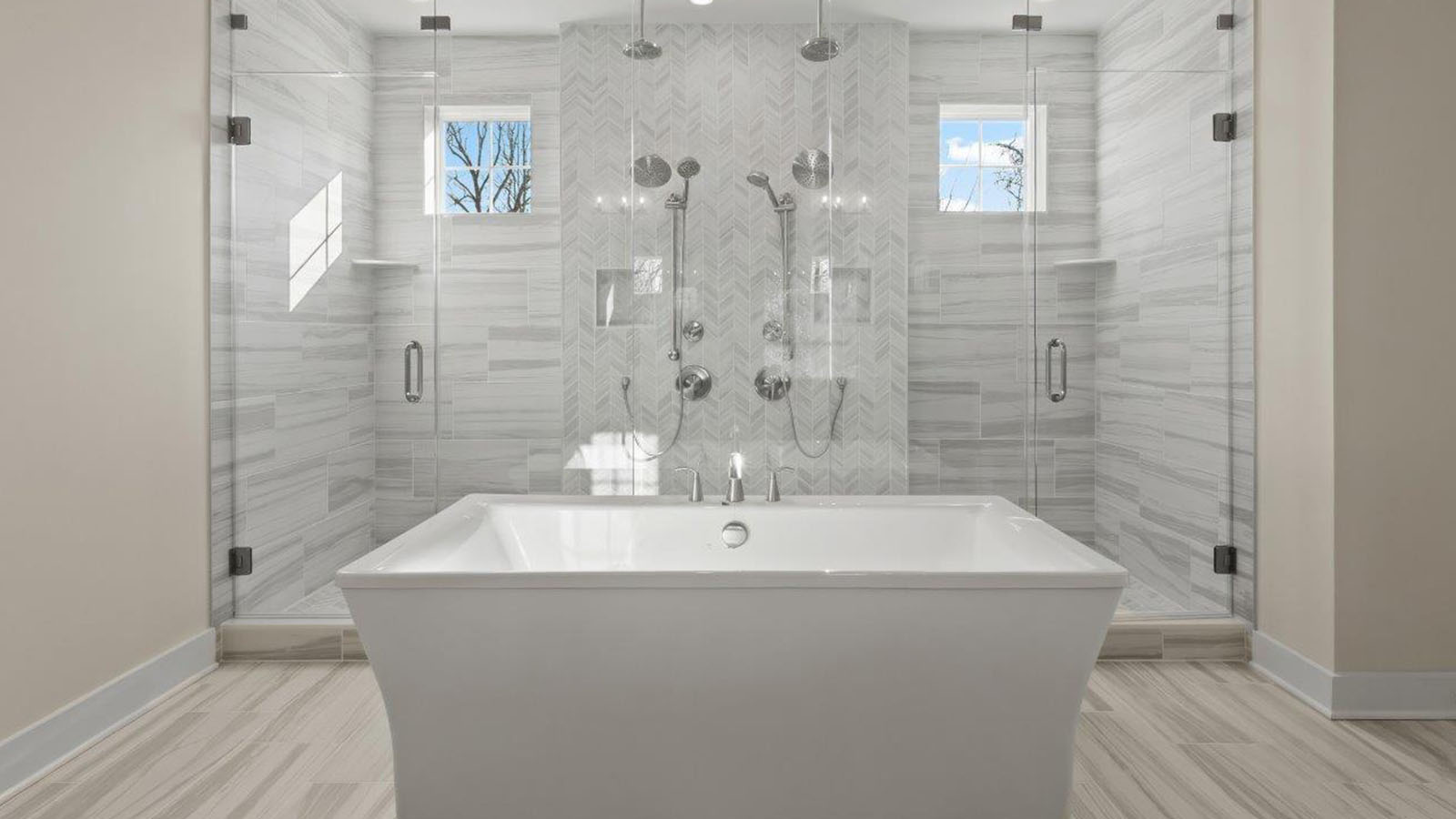central soaking tub and large glass shower