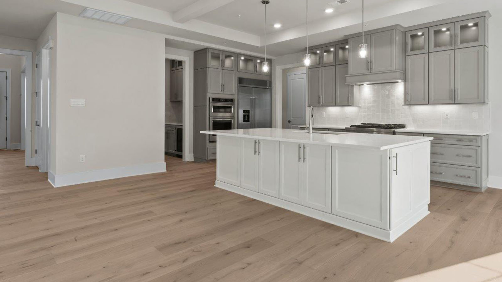 seating at island facing into living room