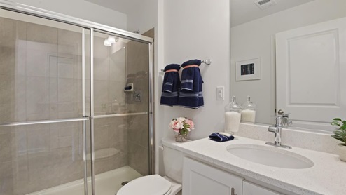 full bathroom with standing glass shower
