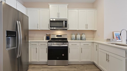 kitchen with white shaker cabinets