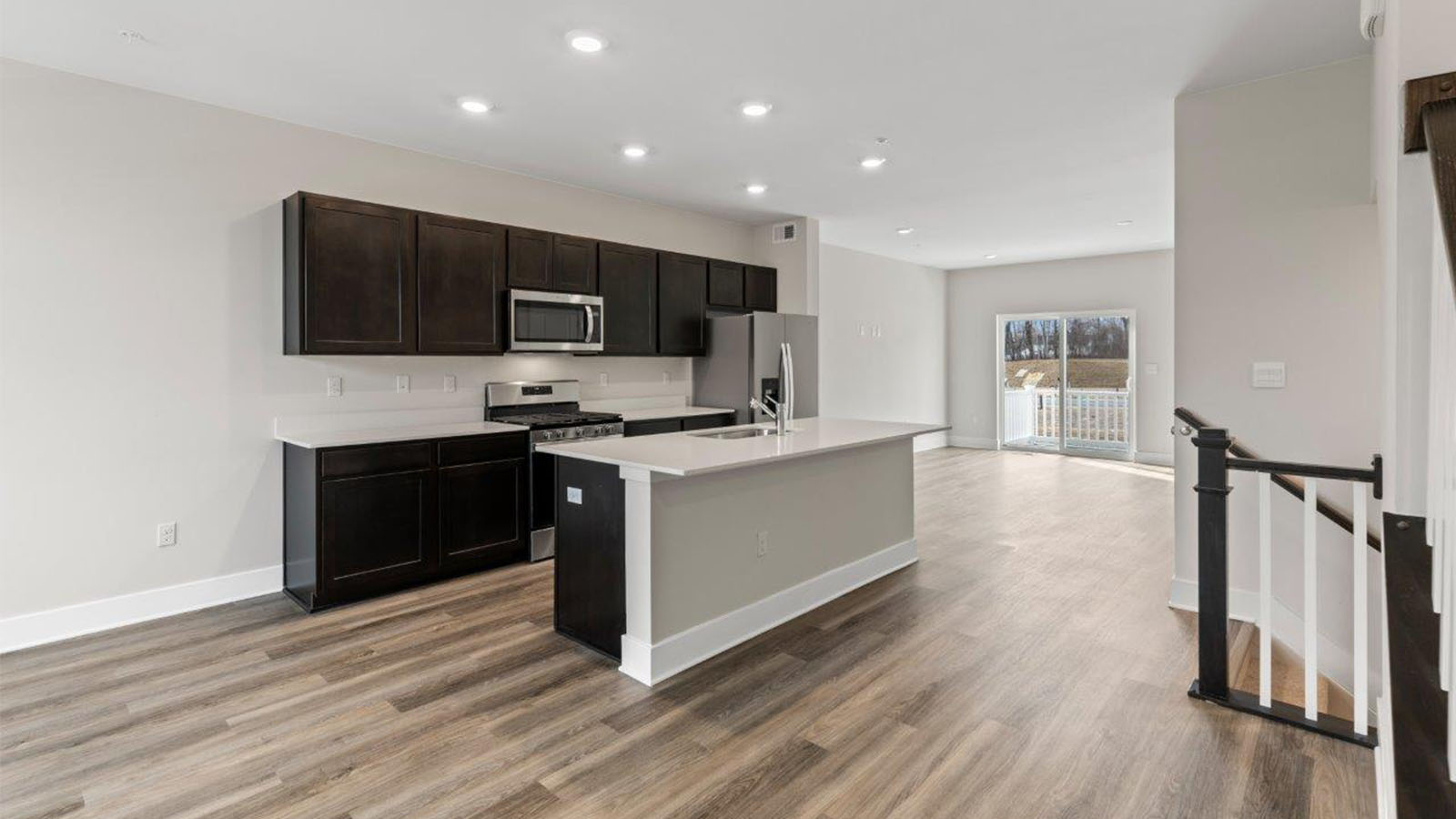 main level kitchen with espresso cabinets