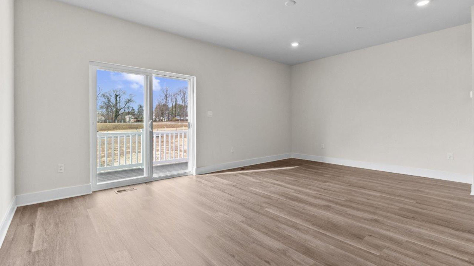 open concept living room with sliding back door