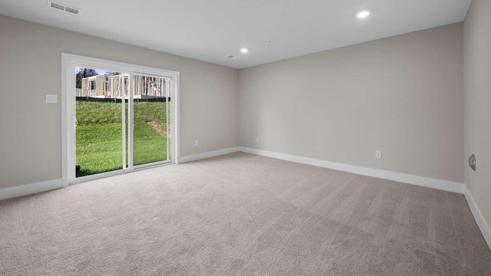 lower level rec room with sliding back door