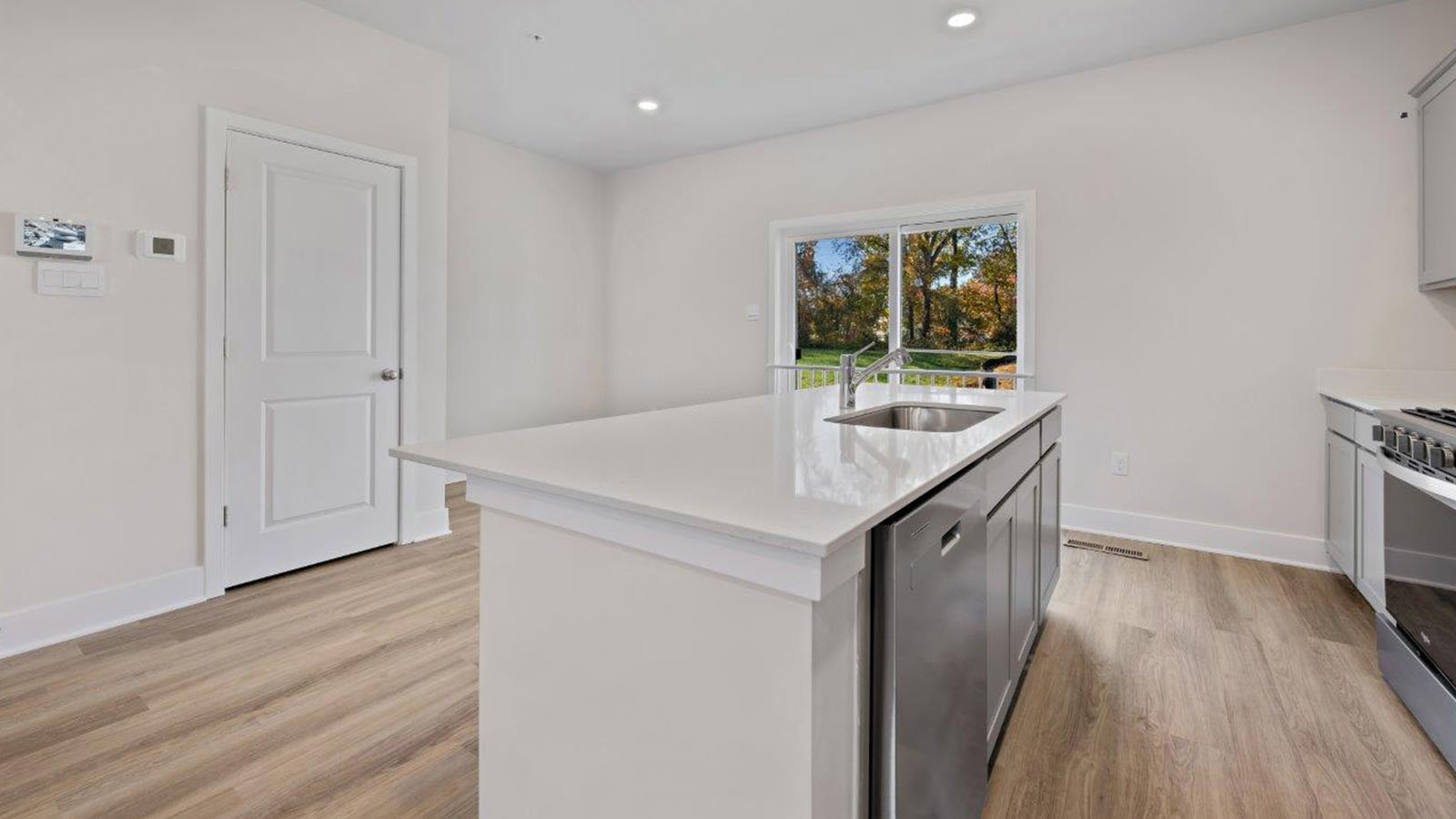 dishwasher and sink in island