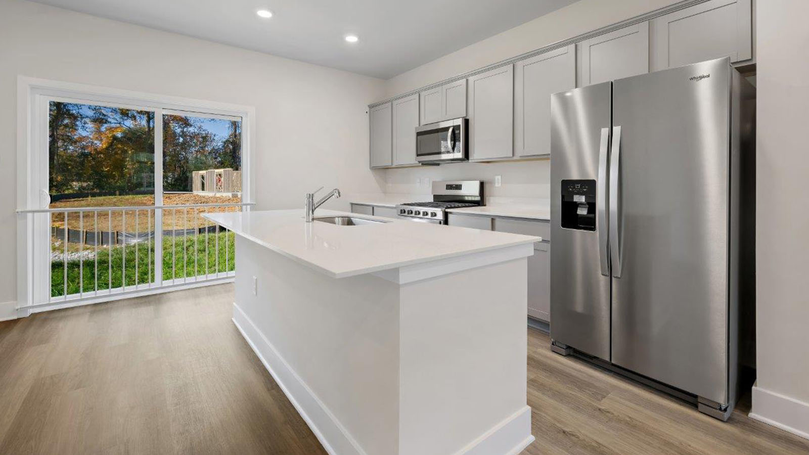 grey shaker cabinets with quartz counters