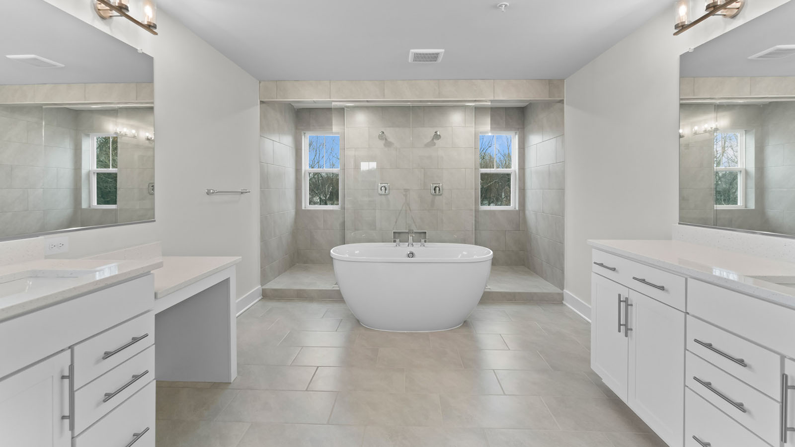 central soaking tub, shower and dual vanities