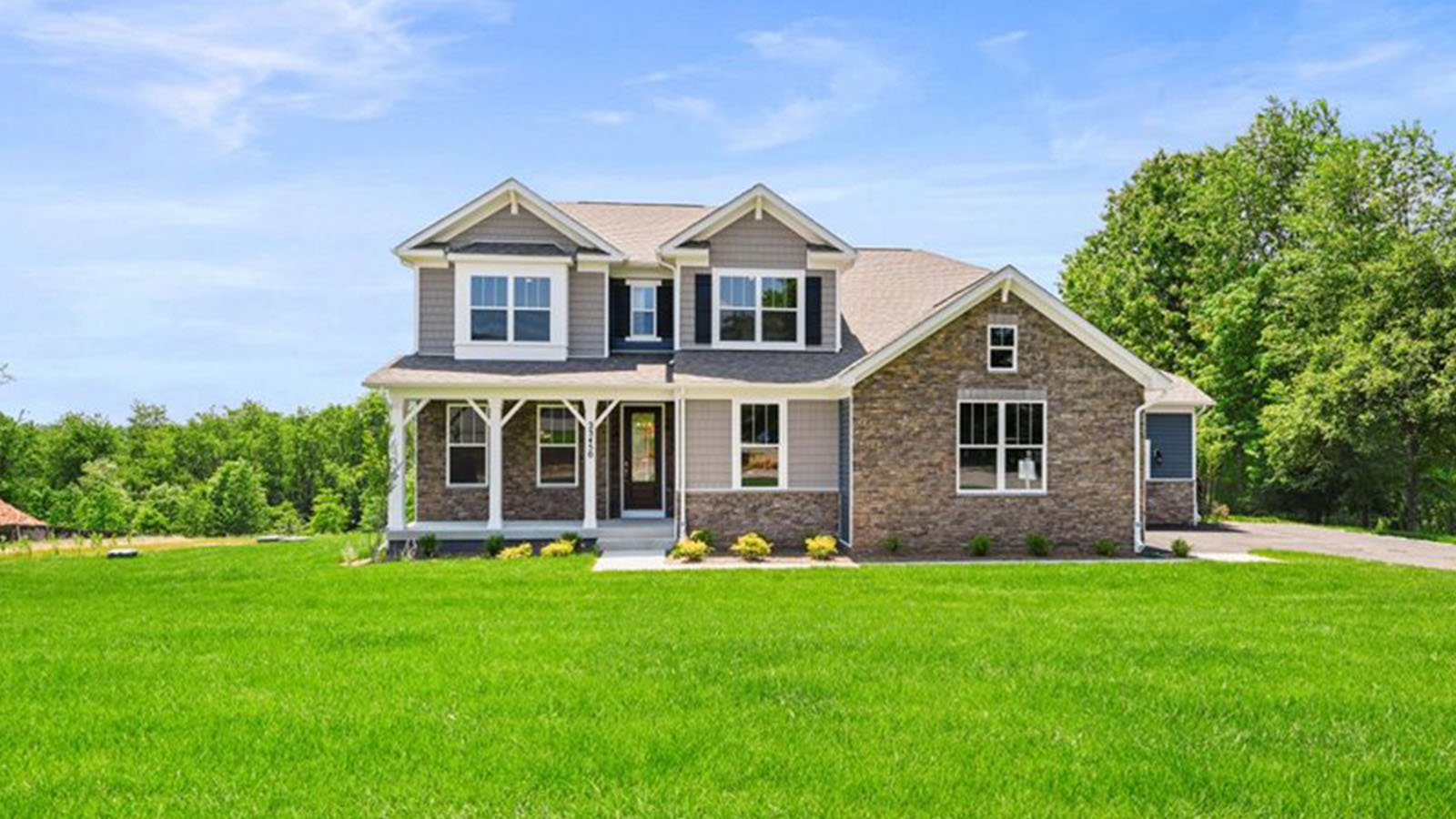frontal view of home with stone