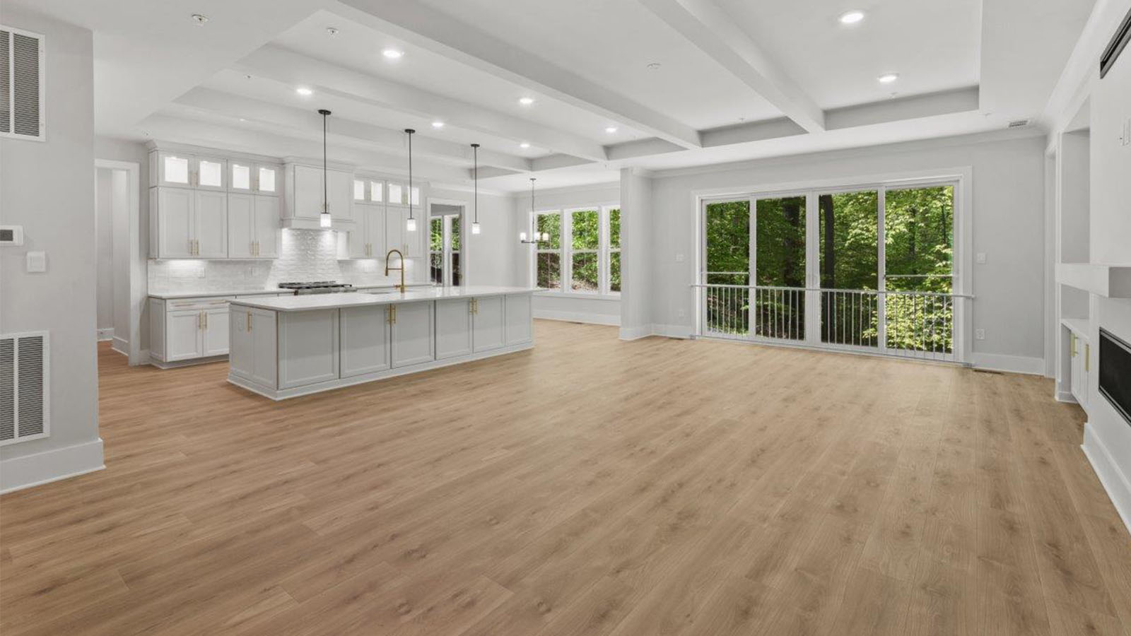 kitchen facing into large living room
