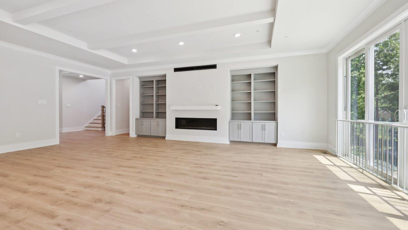 large living room facing linear fireplace