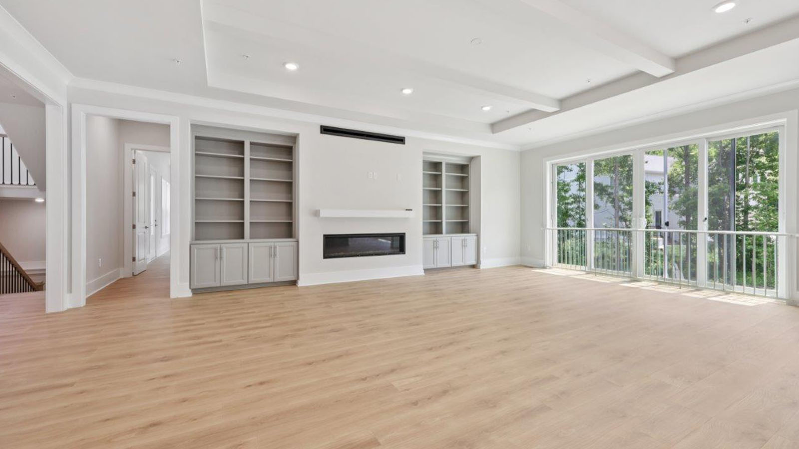 large living room facing linear fireplace