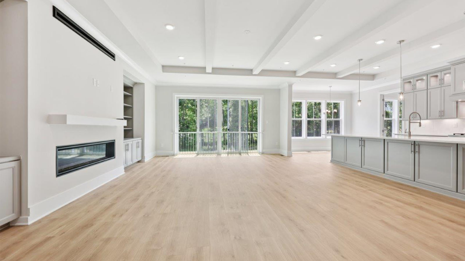 large living room facing linear fireplace