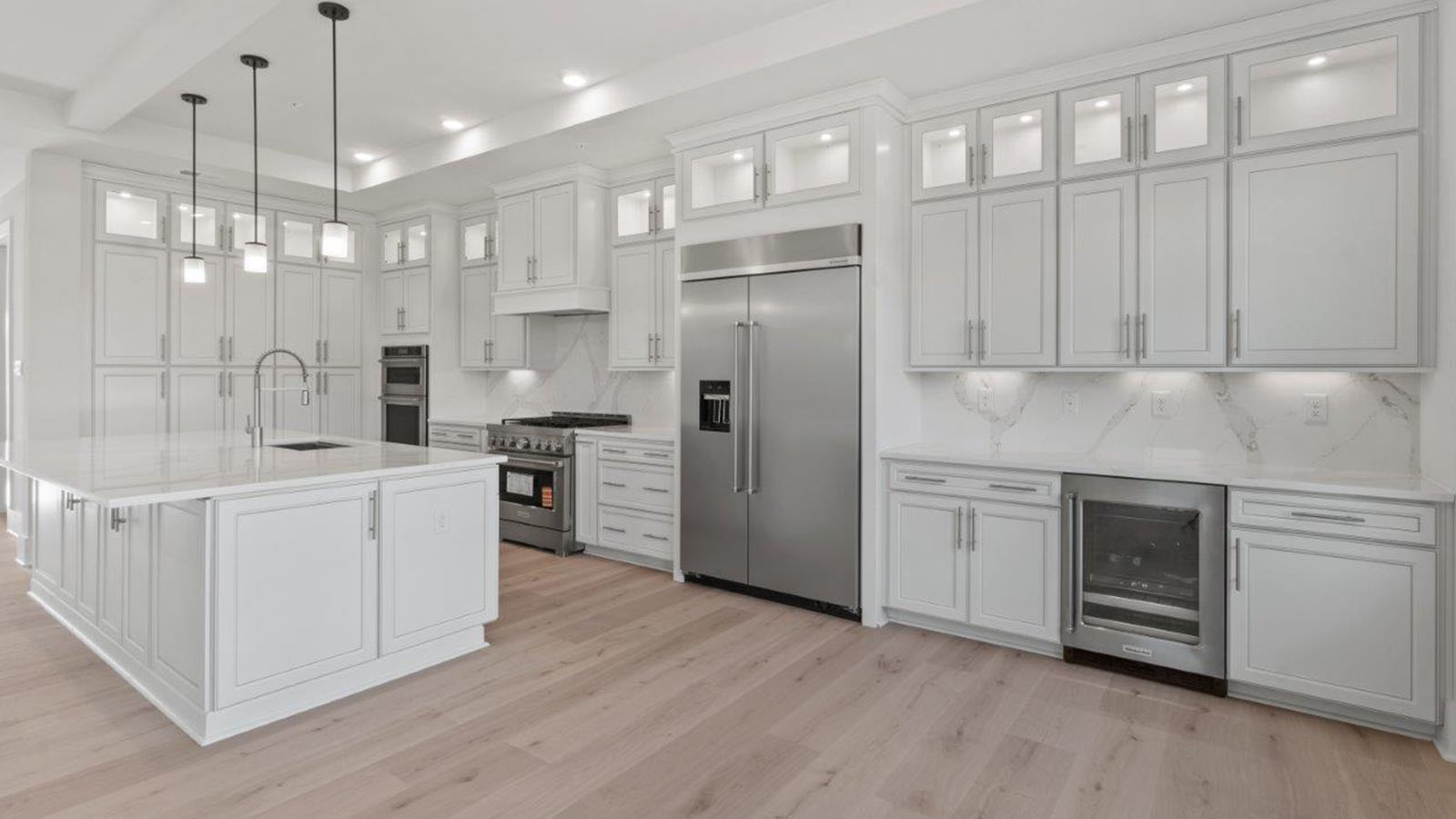 spacious open concept kitchen with large central island