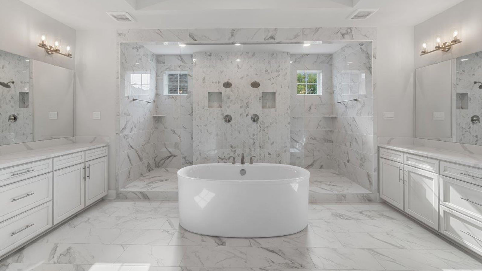 master bathroom with soaking tub and shower