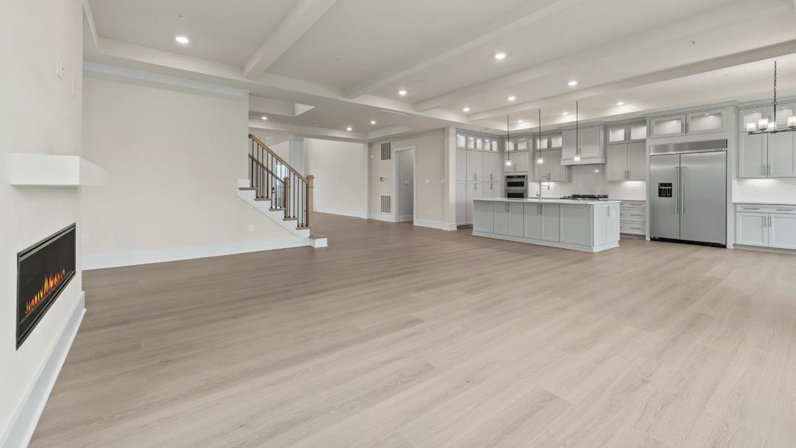 large living room facing linear fireplace