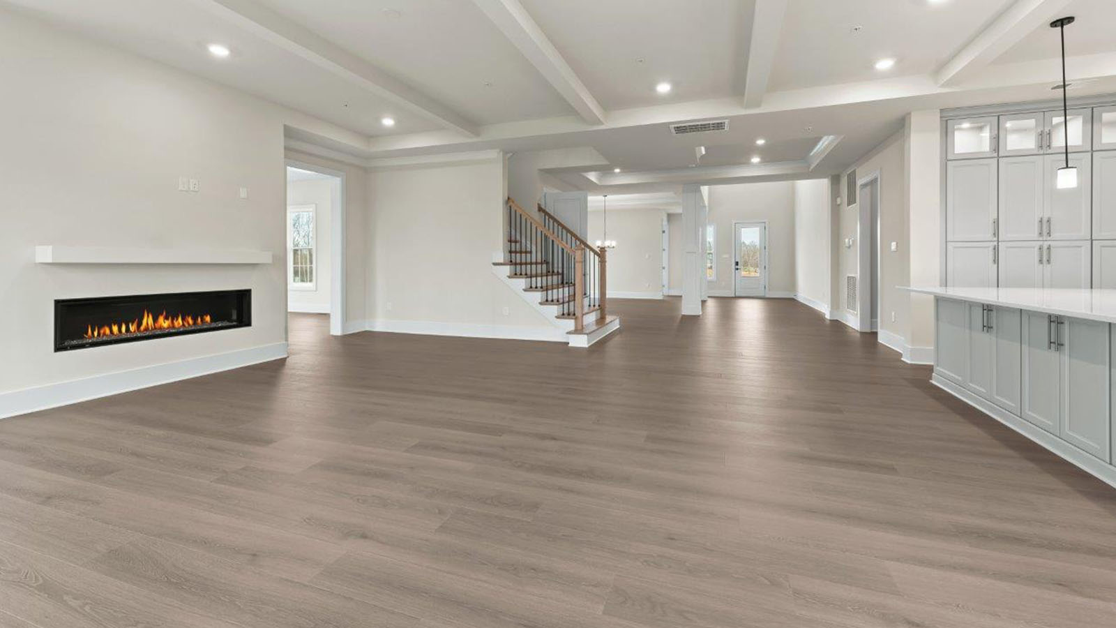 large living room facing linear fireplace