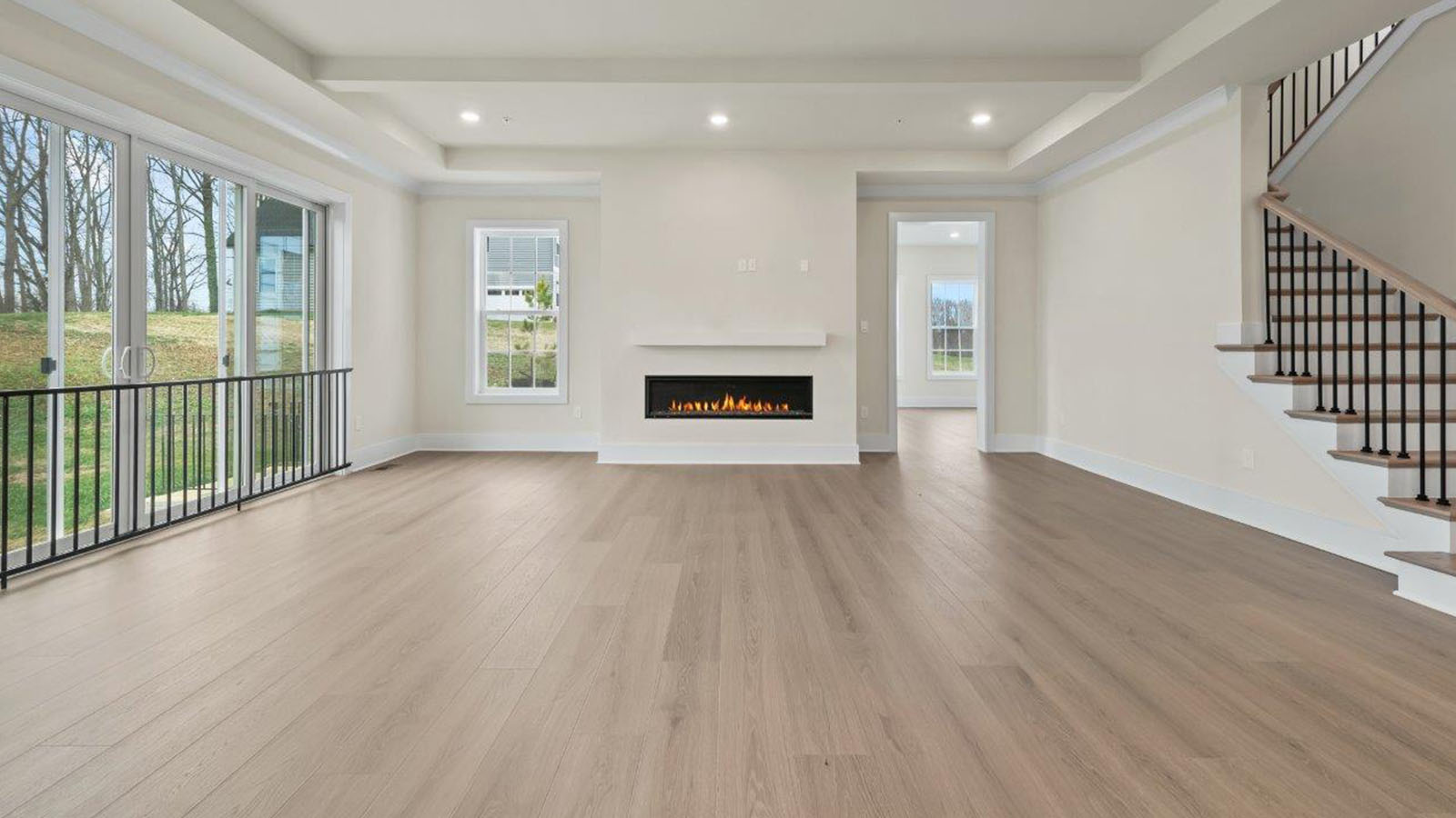 large living room facing linear fireplace