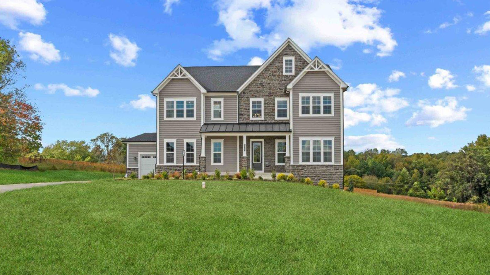 modern farmhouse exterior of hampton home