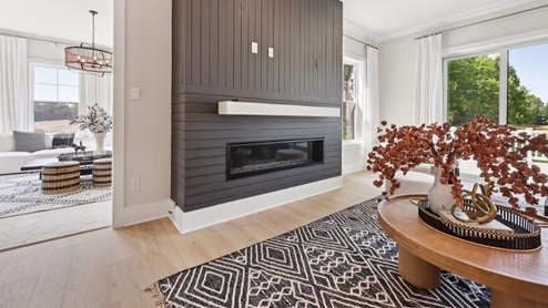 open concept living room facing fireplace