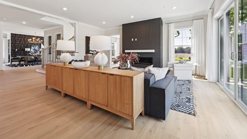 open concept living room facing fireplace