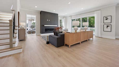 open concept living room facing fireplace