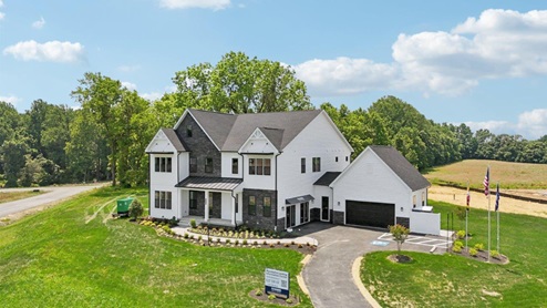 modern farmhouse exterior of model