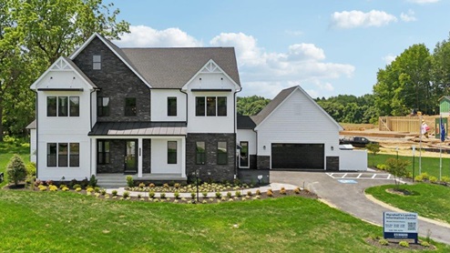 modern farmhouse exterior of model