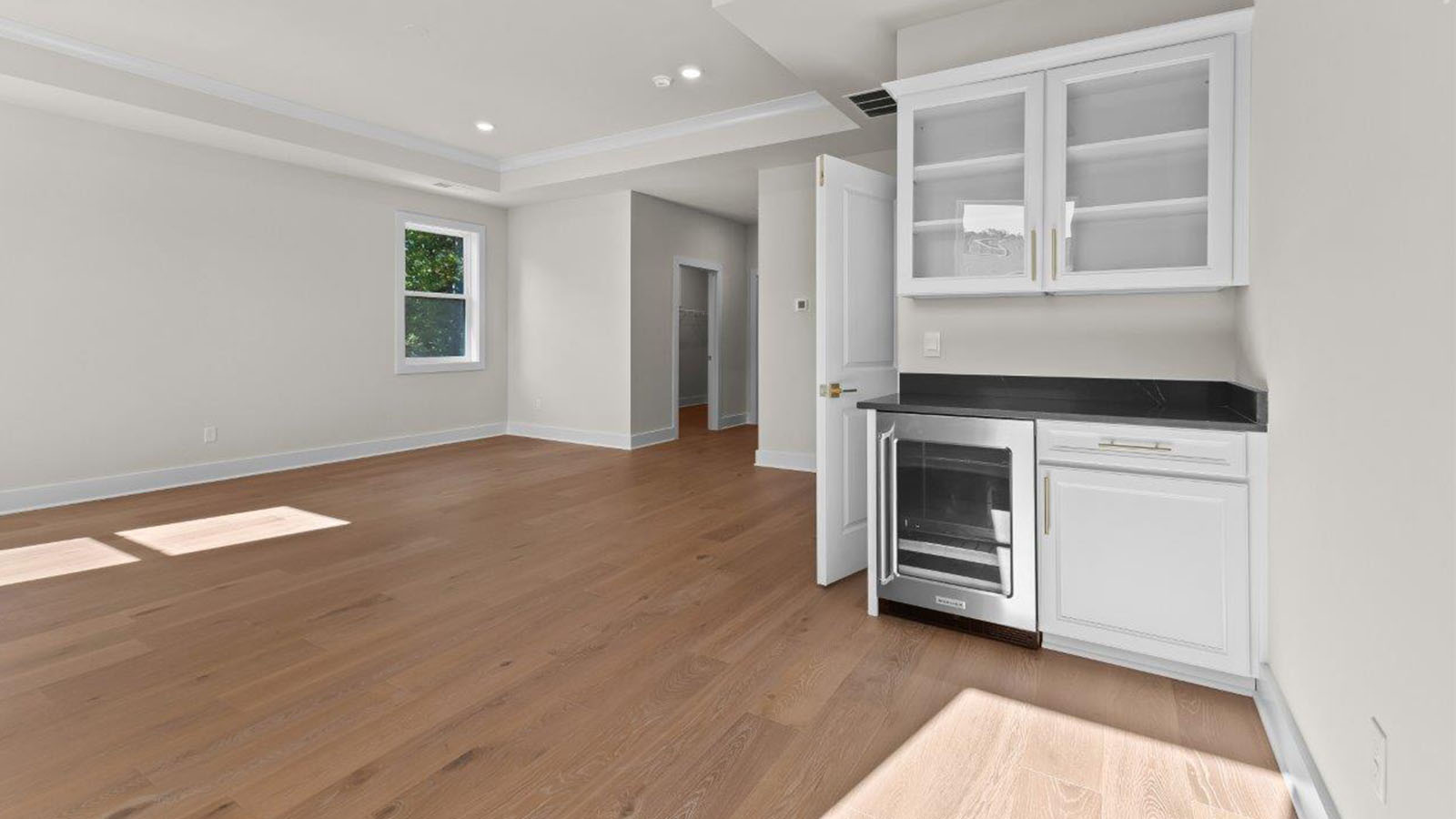 beverage chiller and bar in master bedroom