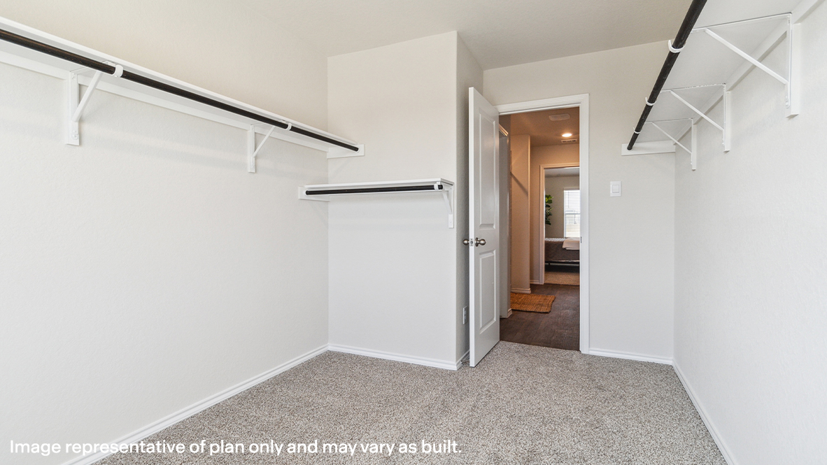 Primary walk-in closet.