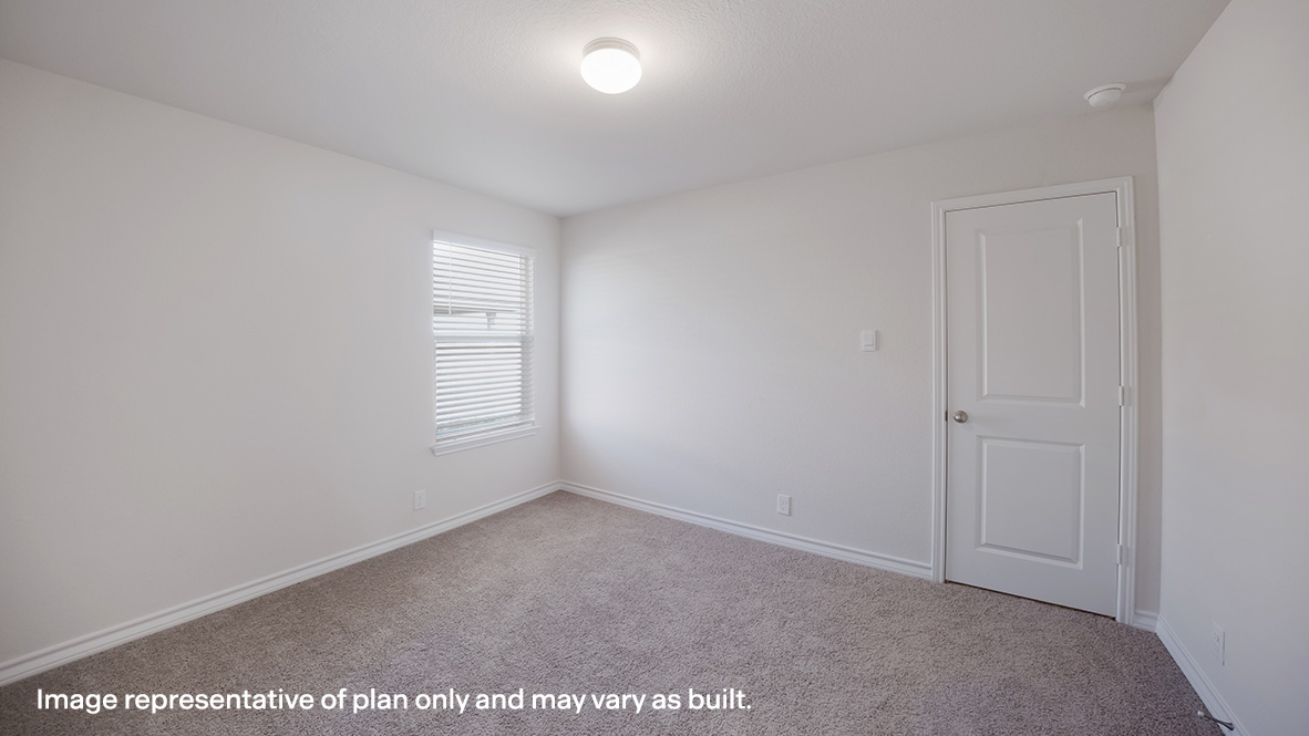 Secondary bedroom with quality carpet, window and closet.