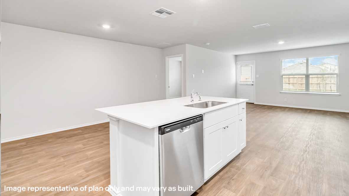 Kitchen island with white cabinets, a sink, and a dishwasher