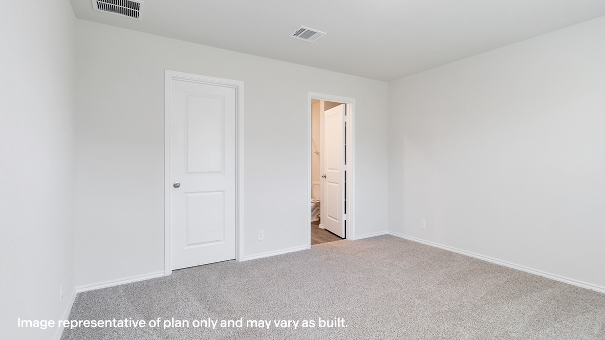 Primary bedroom with ensuite bathroom.