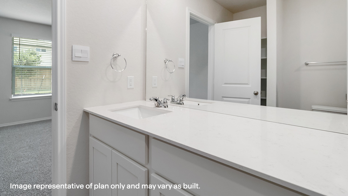 Primary ensuite bathroom with single vanity sink and tub and shower combo.