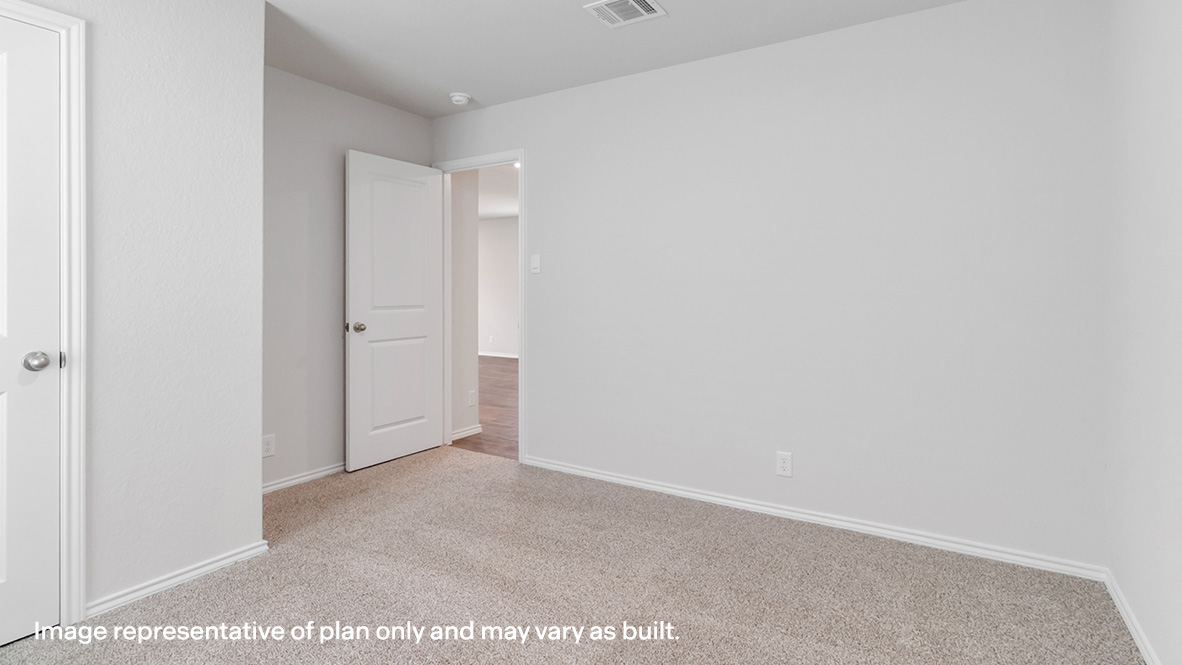 Fourth bedroom with carpet and closet.