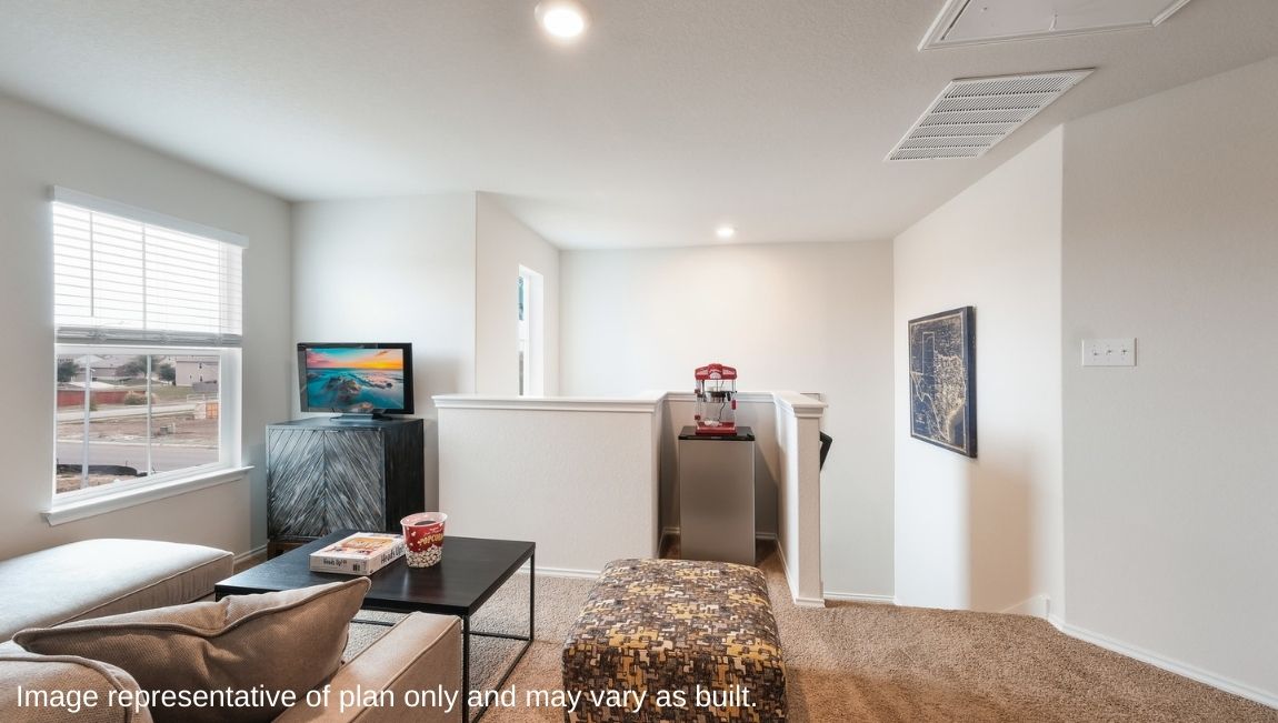 Large, versatile loft space with quality carpet and windows providing plenty of natural light.