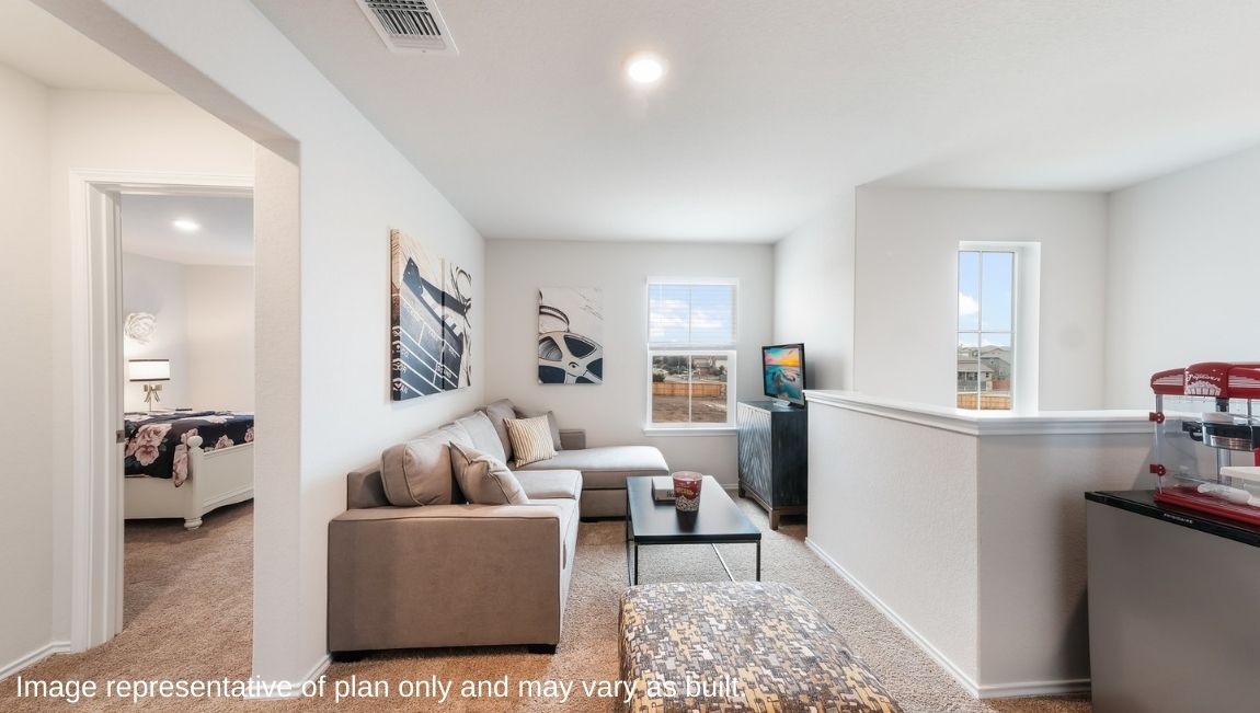 Large, versatile loft space with quality carpet and windows providing plenty of natural light.