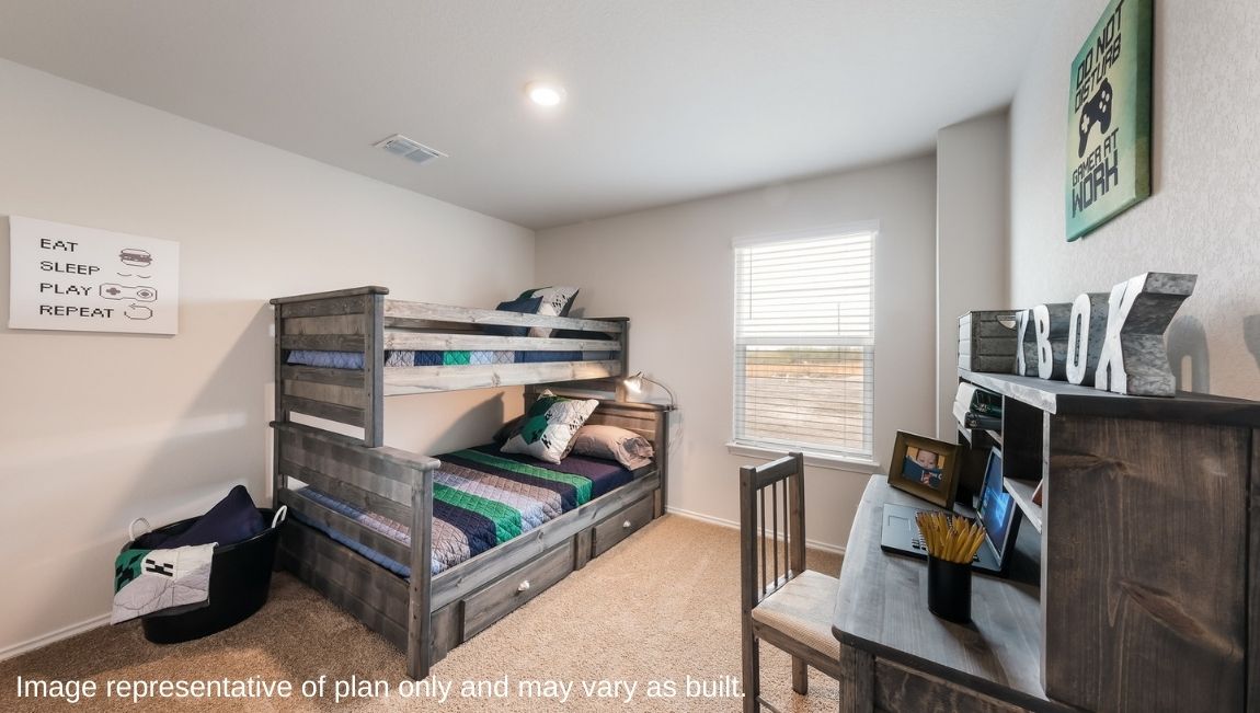 Fourth bedroom with quality carpet, window and closet.