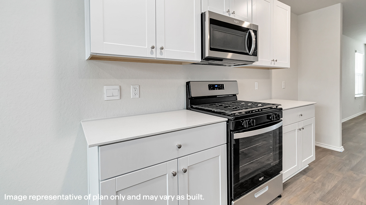 kitchen with stainless steel appliances and shaker style cabinets