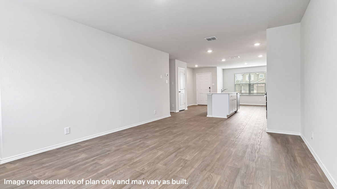 living room flowing into kitchen and dining area
