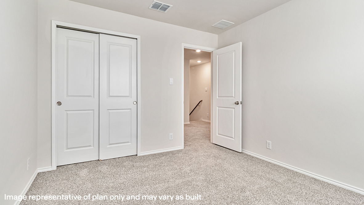 secondary bedroom with closet