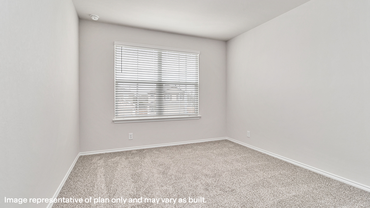 secondary bedroom with large window