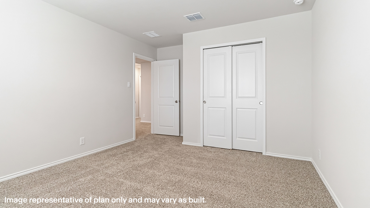 secondary bedroom with closet