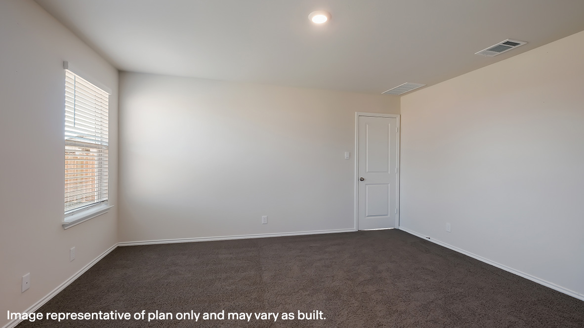 Primary bedroom with quality carpet, large windows and spacious closet.