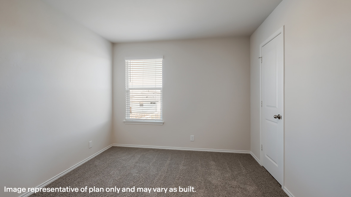 Secondary bedroom with quality carpet, window and closet.