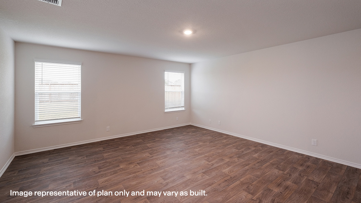 living room with large windows and hard surface flooring
