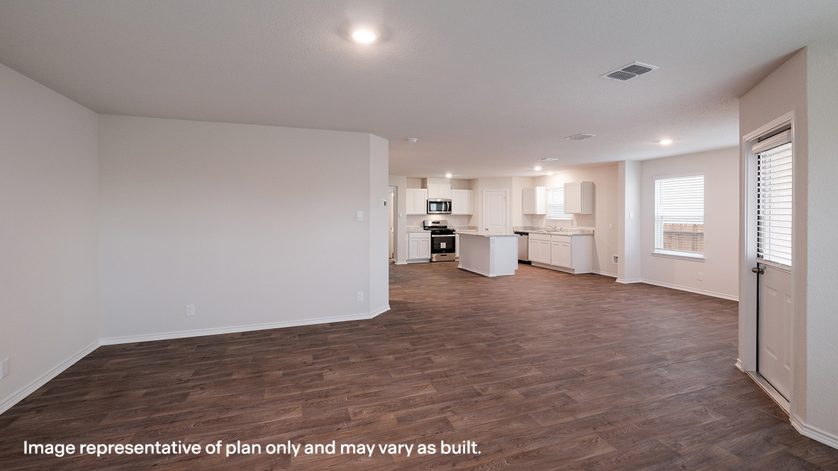 open concept living room flowing to dining area and kitchen