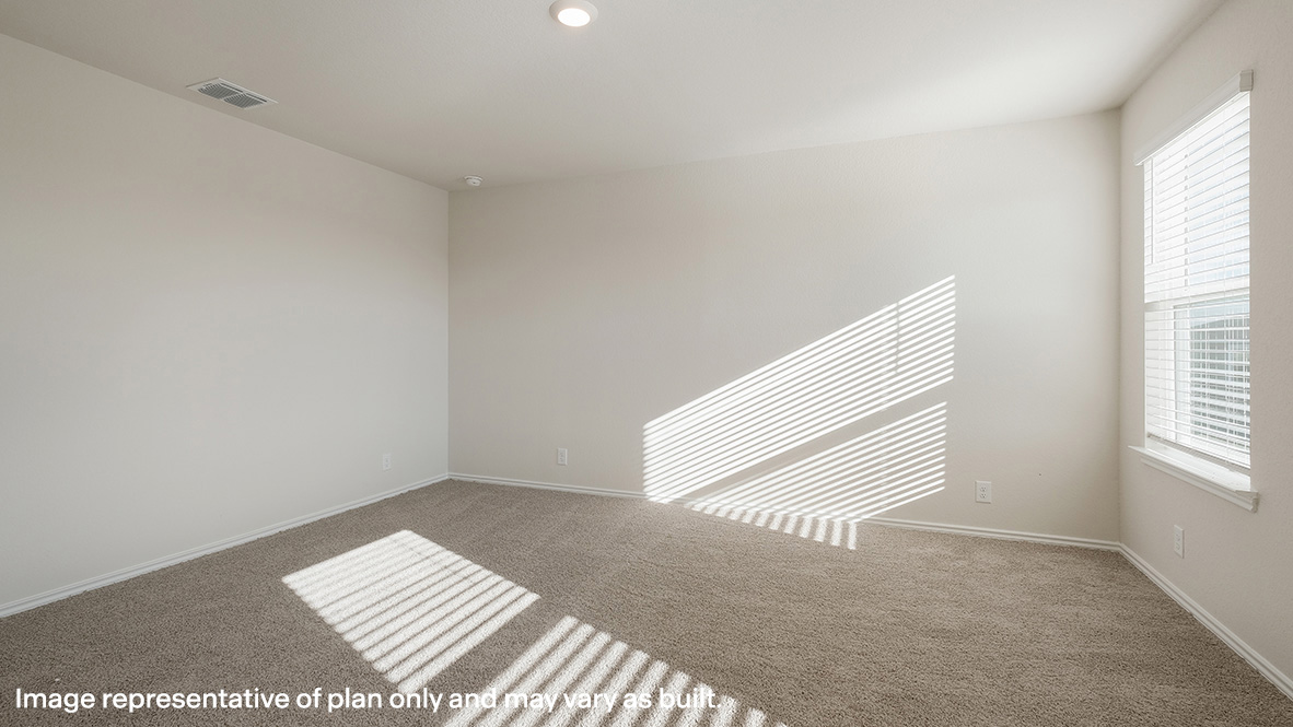 Spacious upstairs primary bedroom with quality carpet and large windows and blinds.