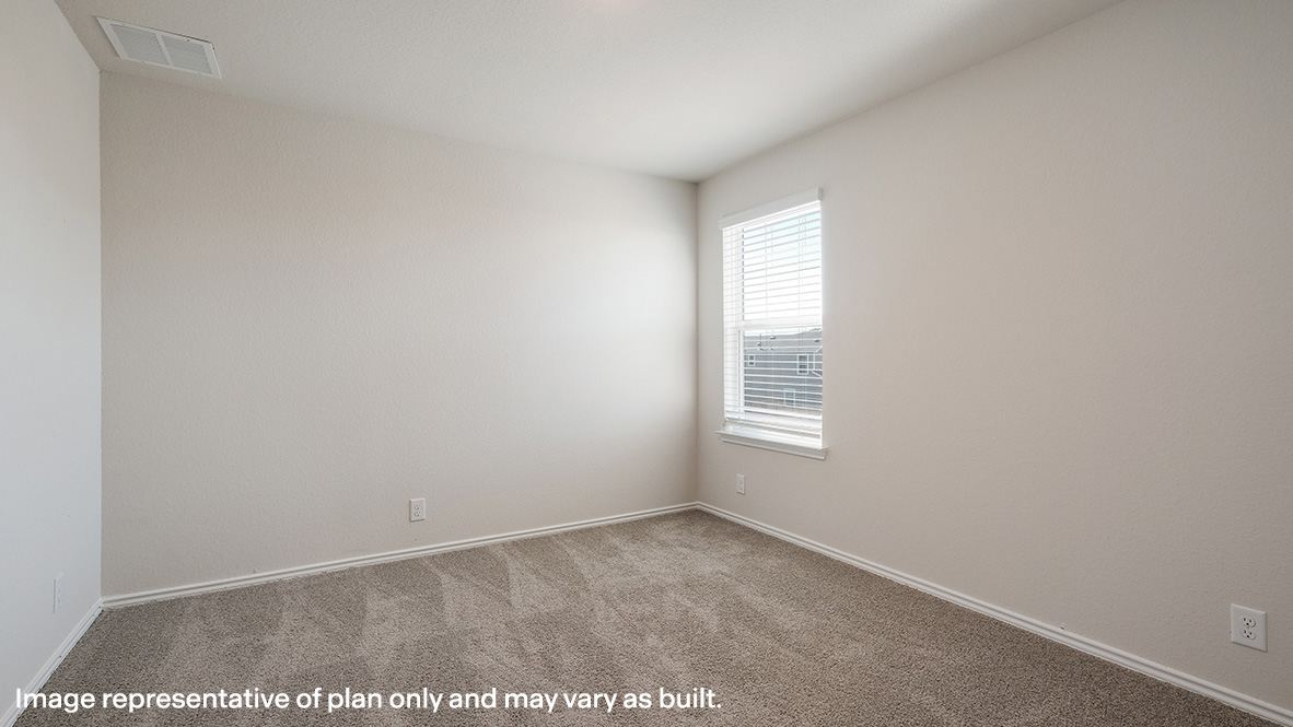 Third bedroom with quality carpet, window and closet.